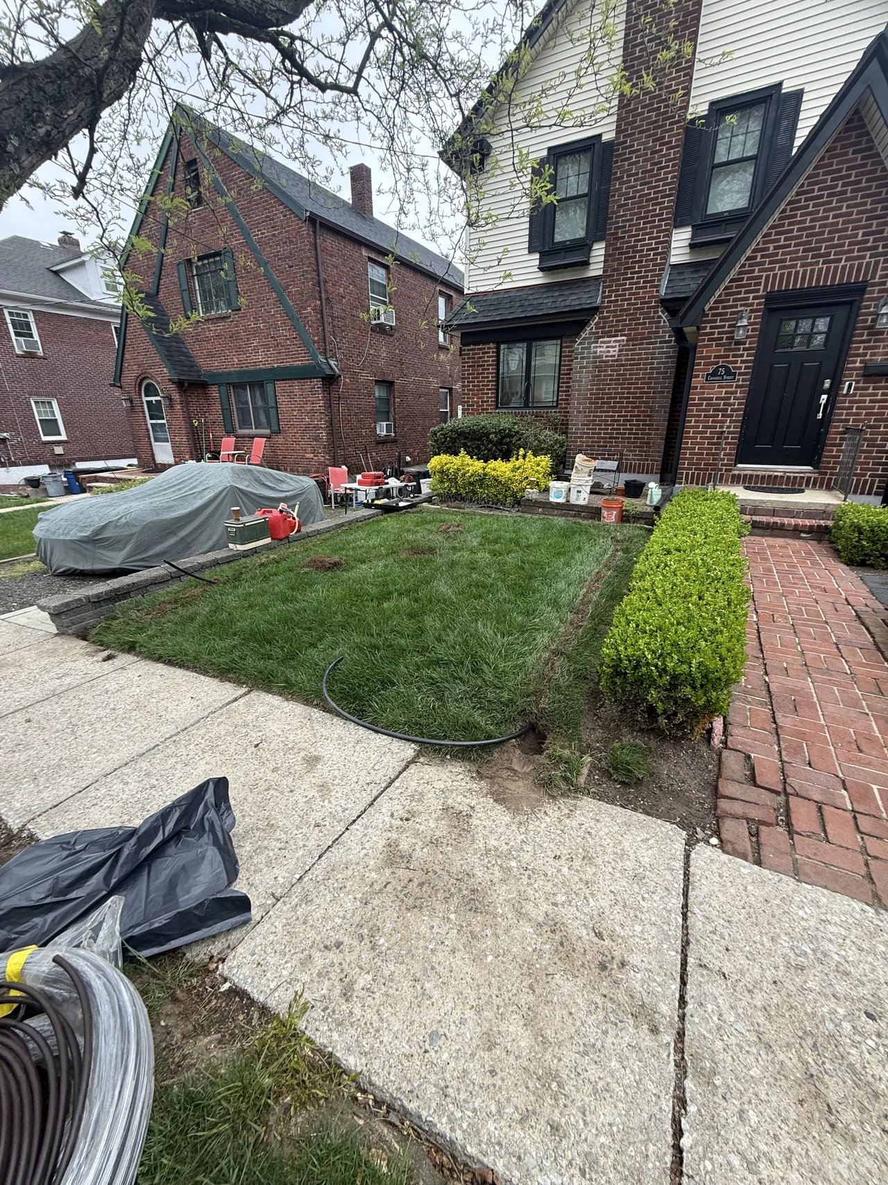 Front walk and lawn prepared for sprinkler service