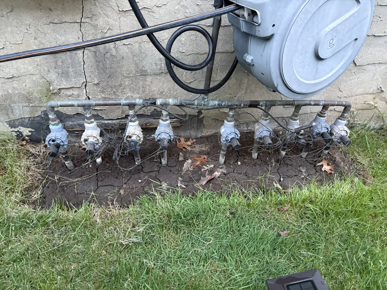 Above-ground irrigation manifold piping and sprinkler valve work