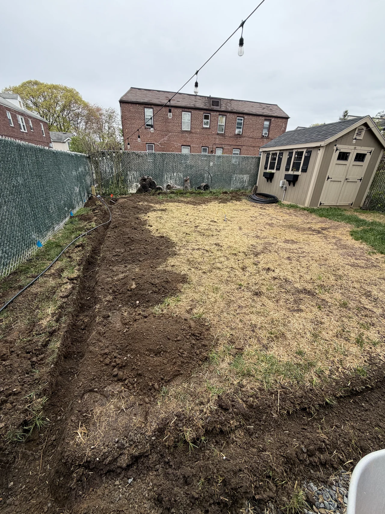 Staten Island yard before sprinkler installation trenching
